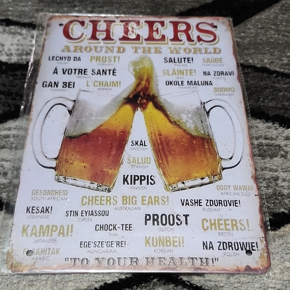 "CHEERS AROUND THE WORLD" VARIOUS WAYS OF SAYING METAL TIN WALL SIGN 8"X12"
